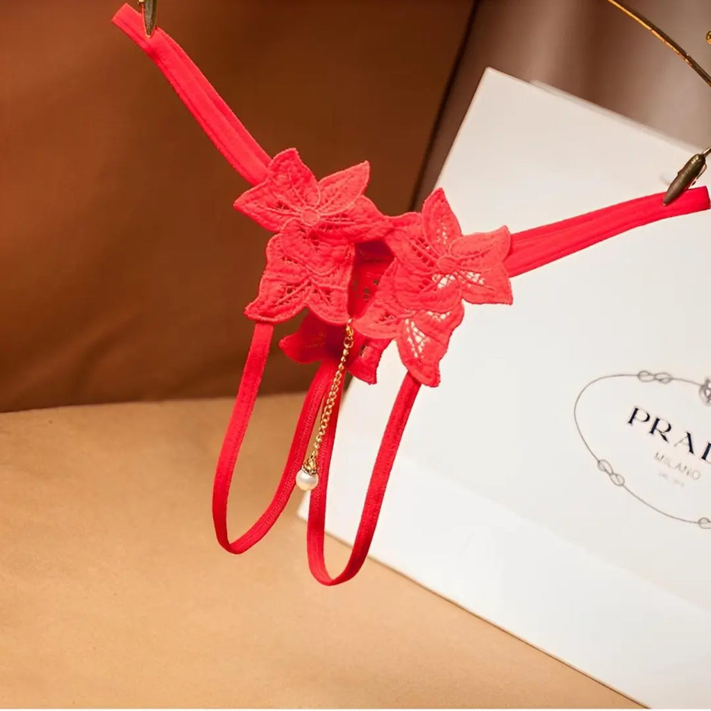 Calcinha com bordado em flor