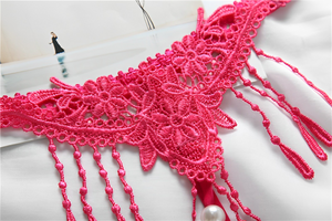 Calcinha com pérolas e franjas